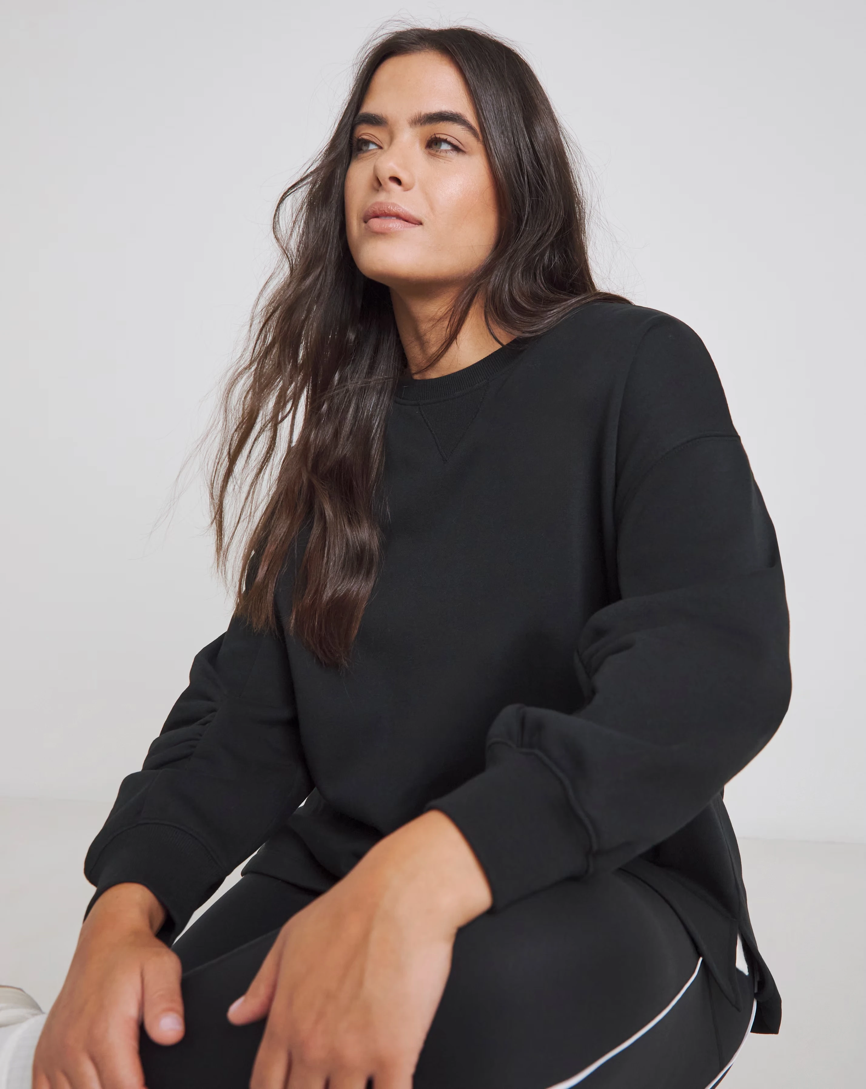 46038-black-curved-hem-dip-back-sweatshirt-1.jpg