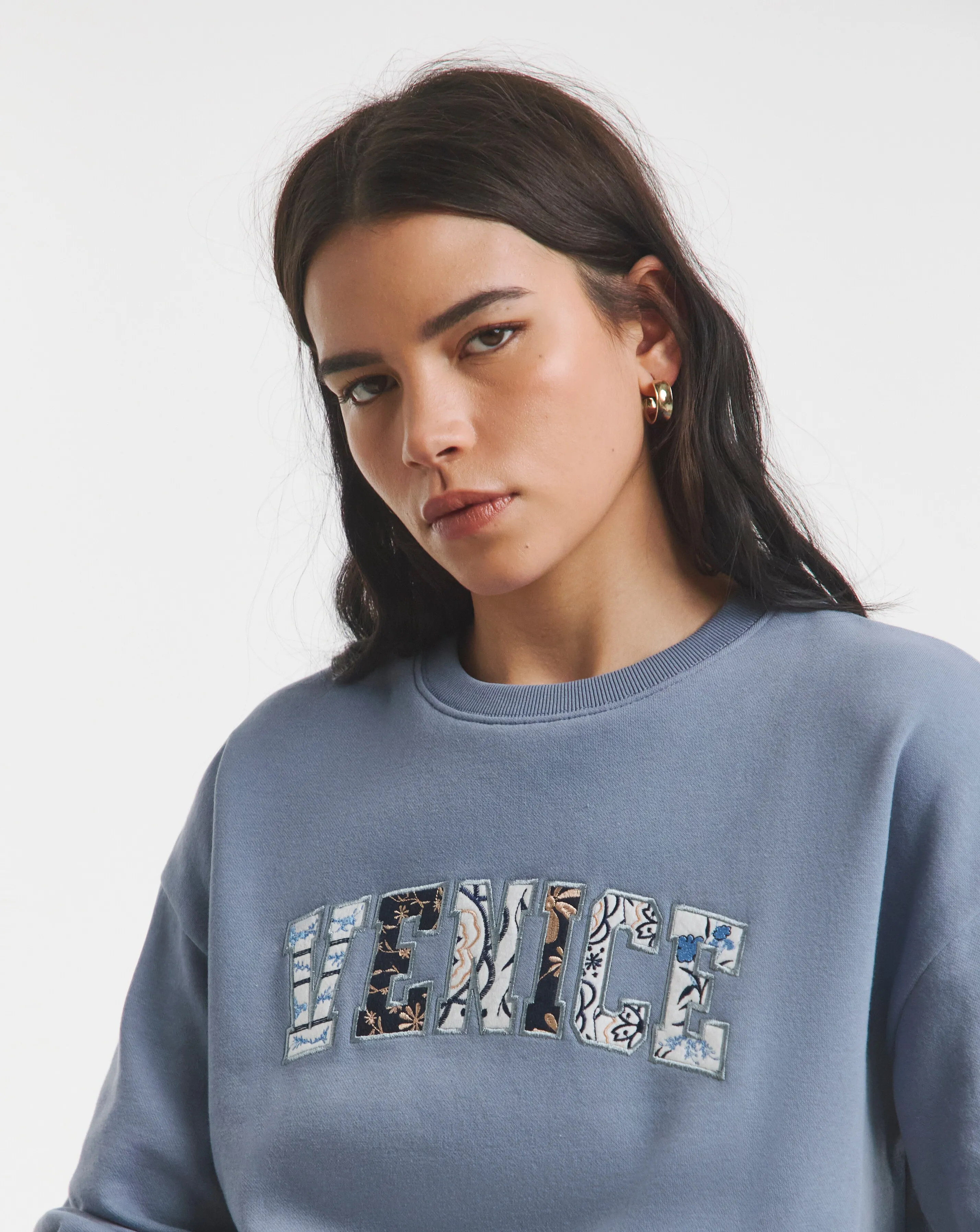 46798-blue-venice-embroidered-graphic-sweatshirt-1.webp