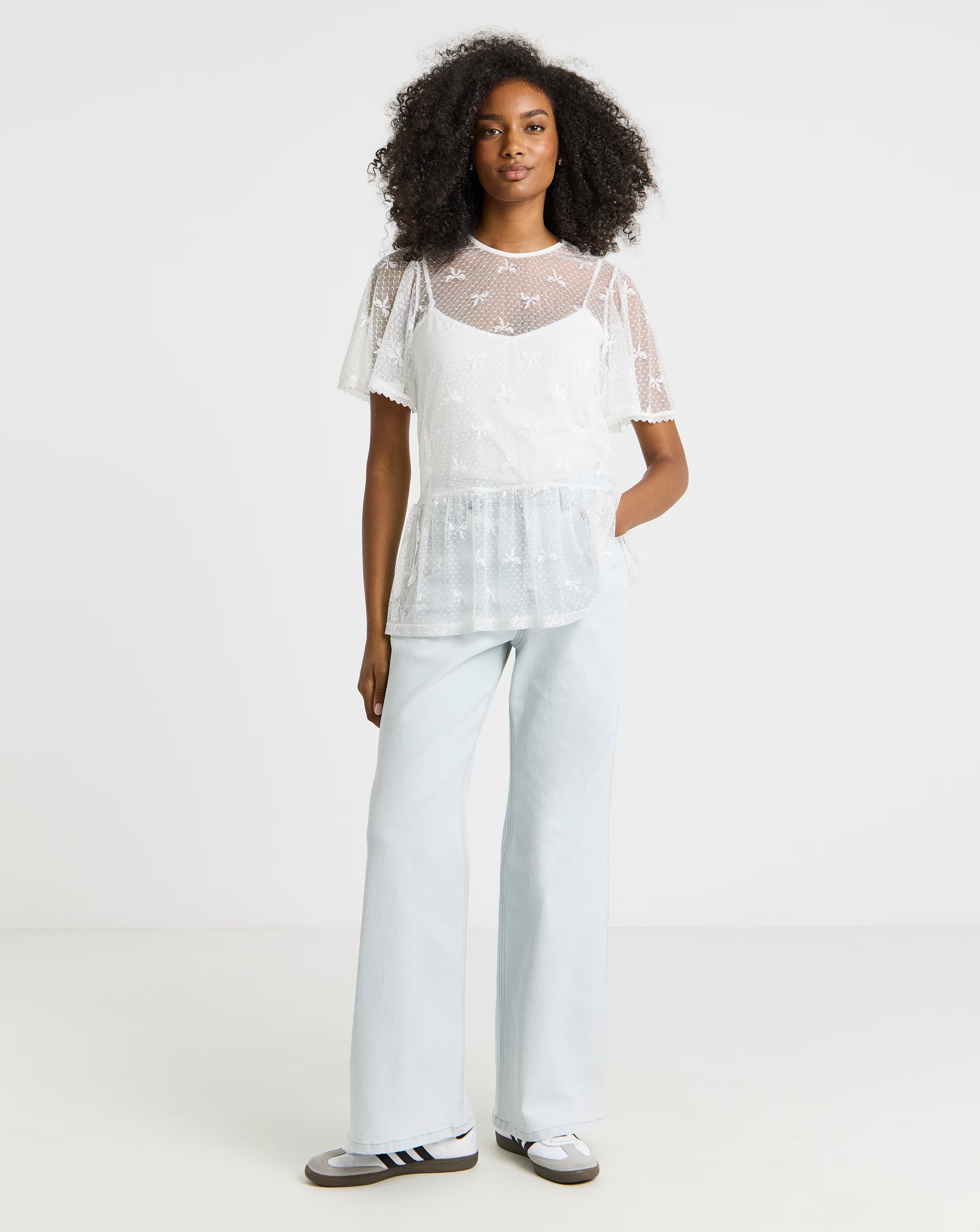 46848-simply-be-ivory-bow-print-lace-top-1.webp