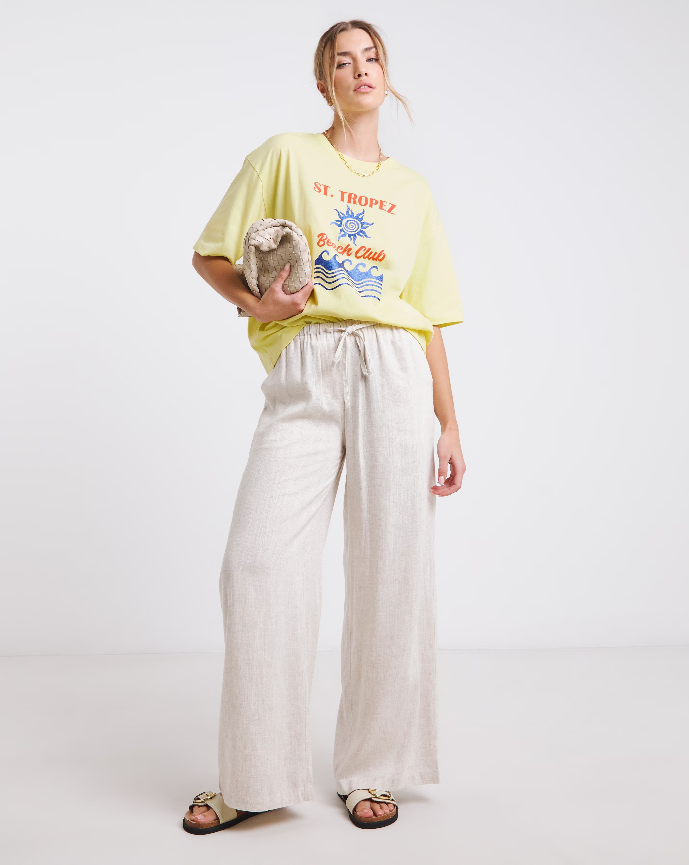 47075-simply-be-light-yellow-glitter-st-tropez-graphic-t-shirt-1.webp