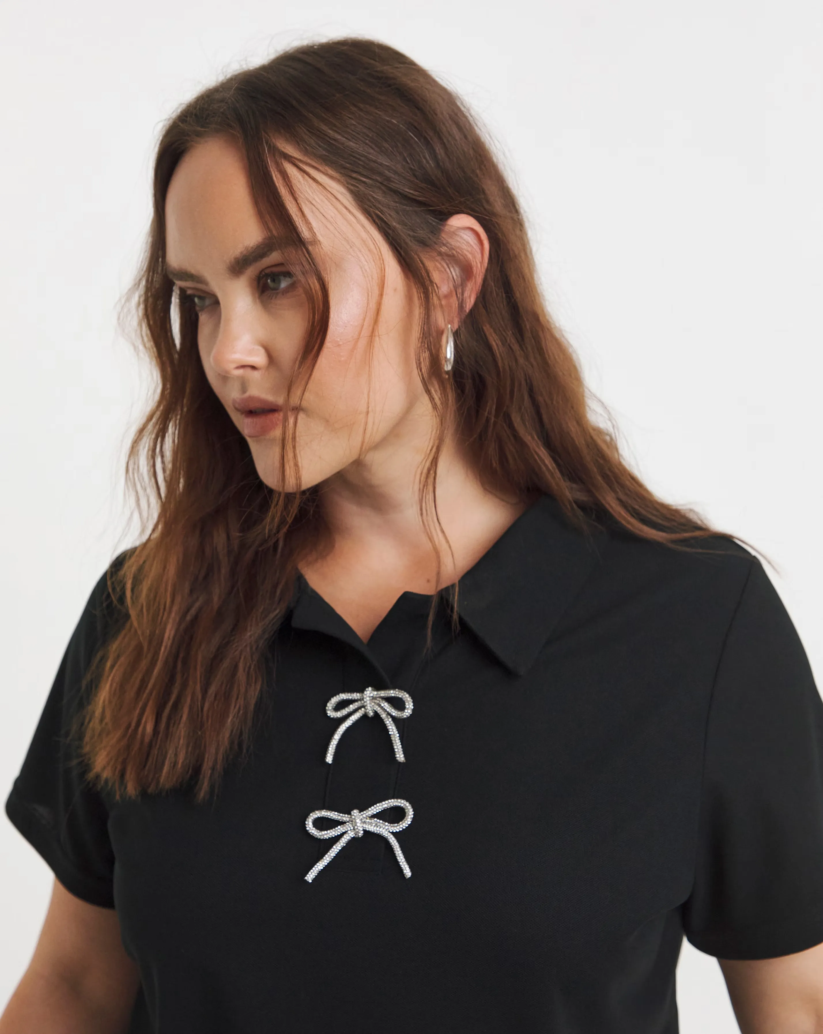 47282-simply-be-black-polo-top-with-bow-embellishment-1.webp