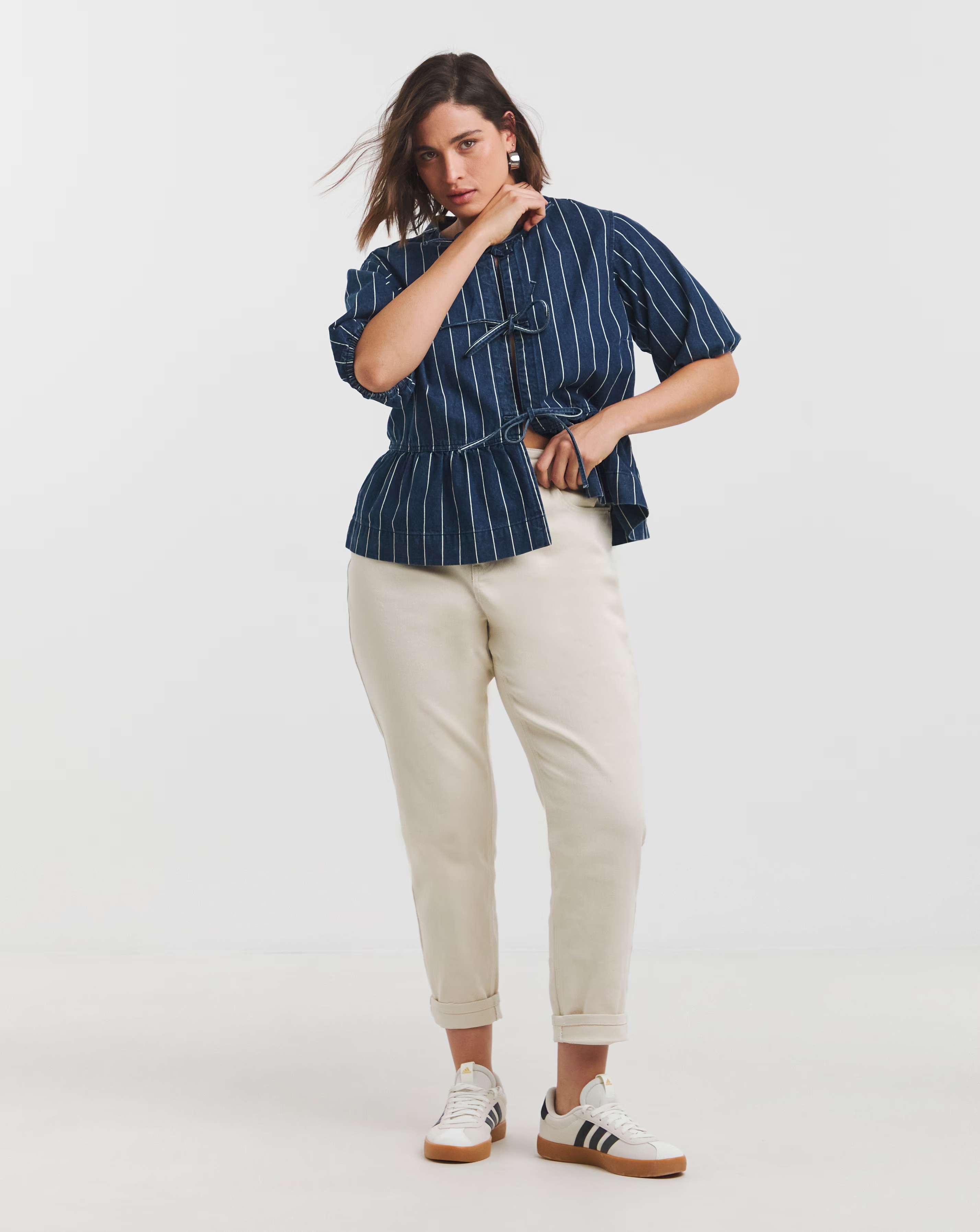 4747-striped-blue-tie-front-denim-peplum-blouse-1.webp