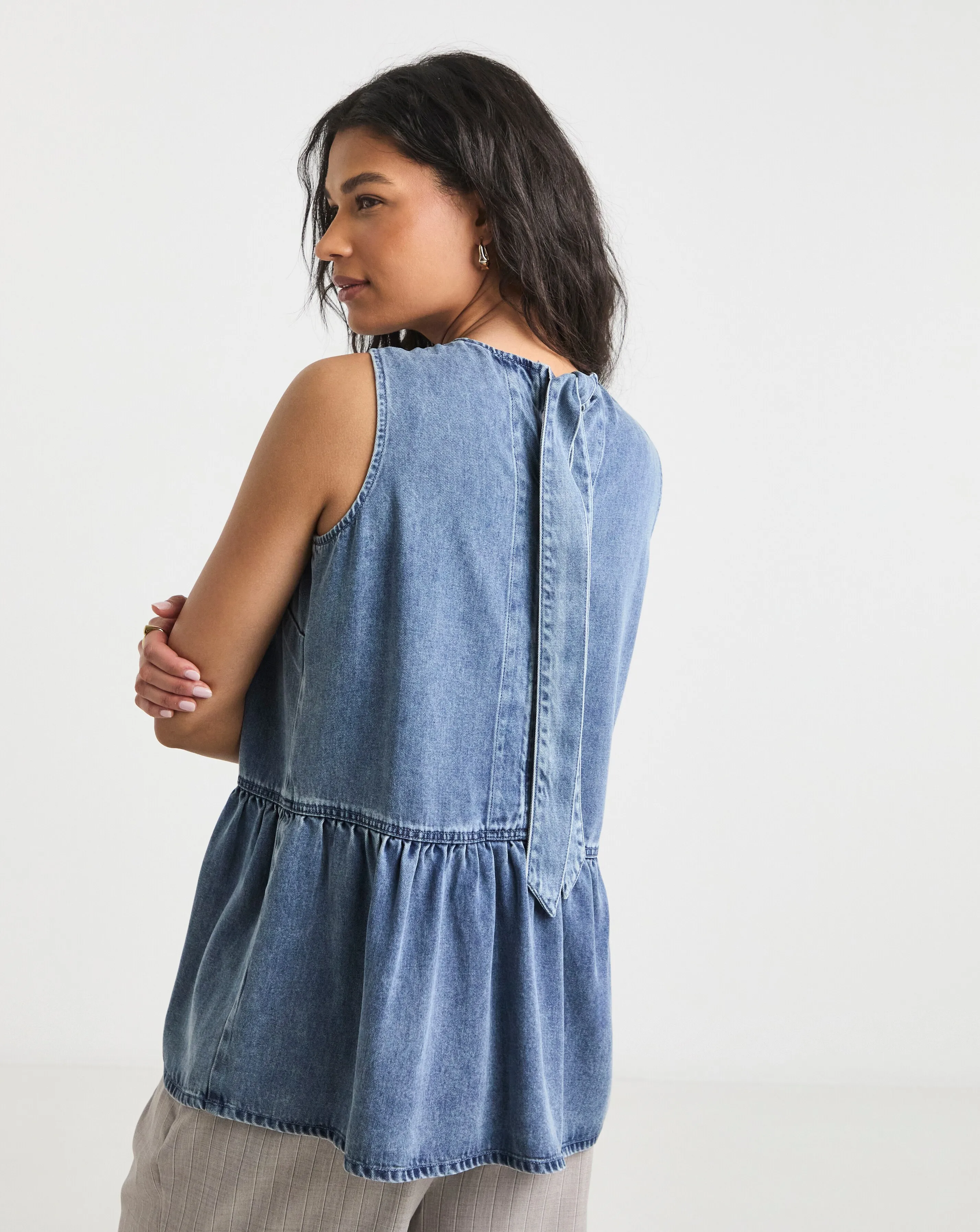 4825-mid-blue-lyocell-peplum-sleeveless-denim-top-1.webp