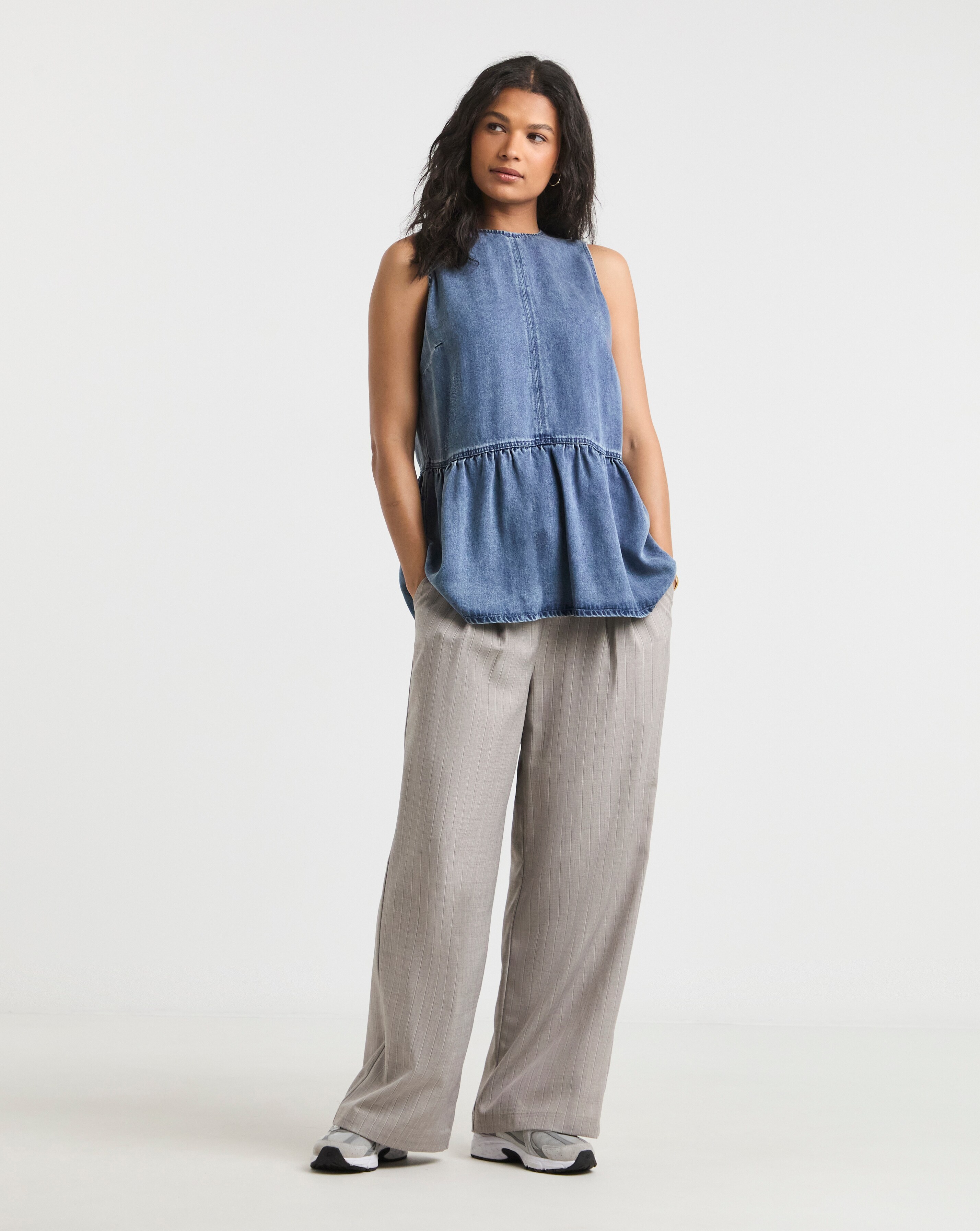 4825-mid-blue-lyocell-peplum-sleeveless-denim-top-1.webp