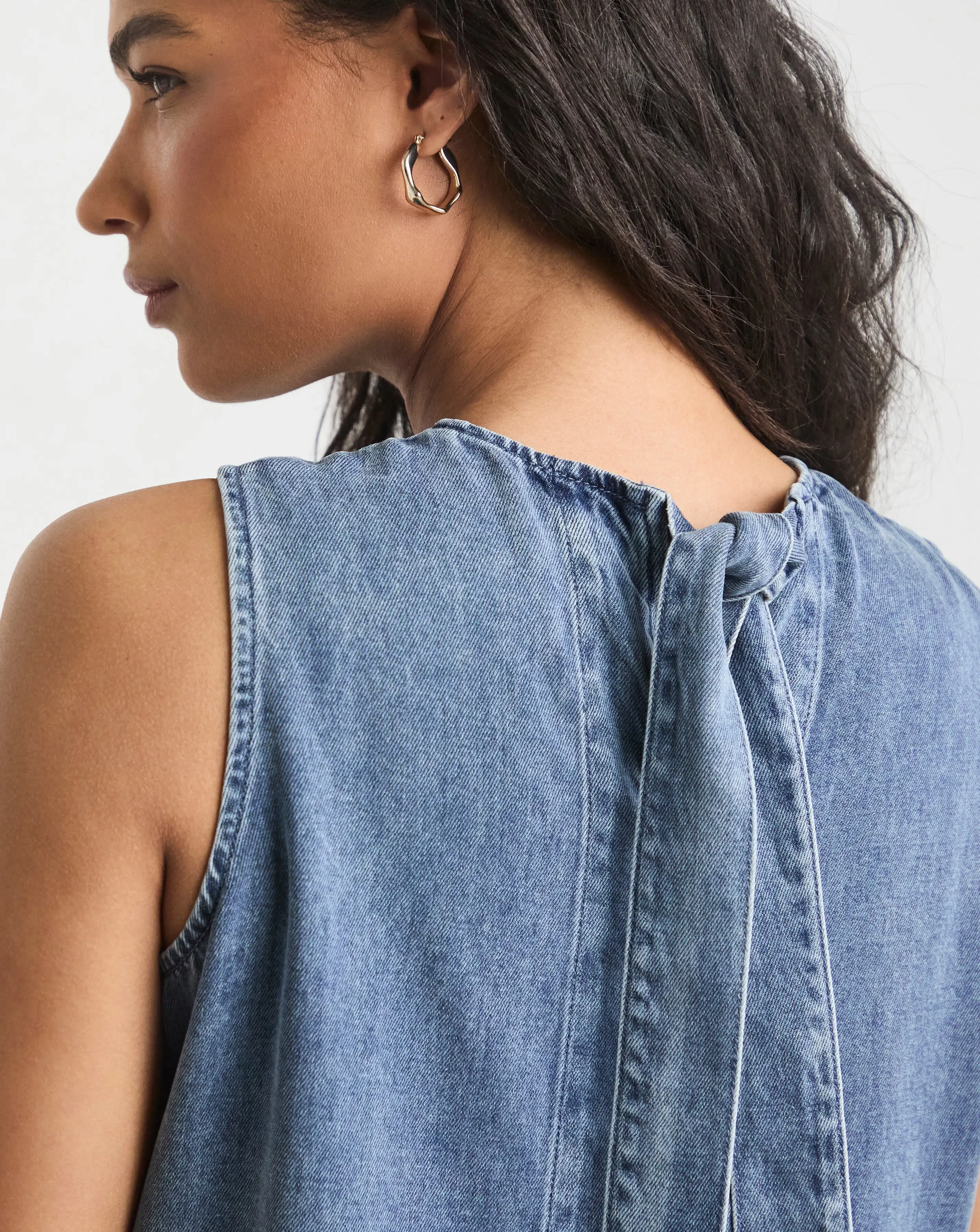 4825-mid-blue-lyocell-peplum-sleeveless-denim-top-1.webp