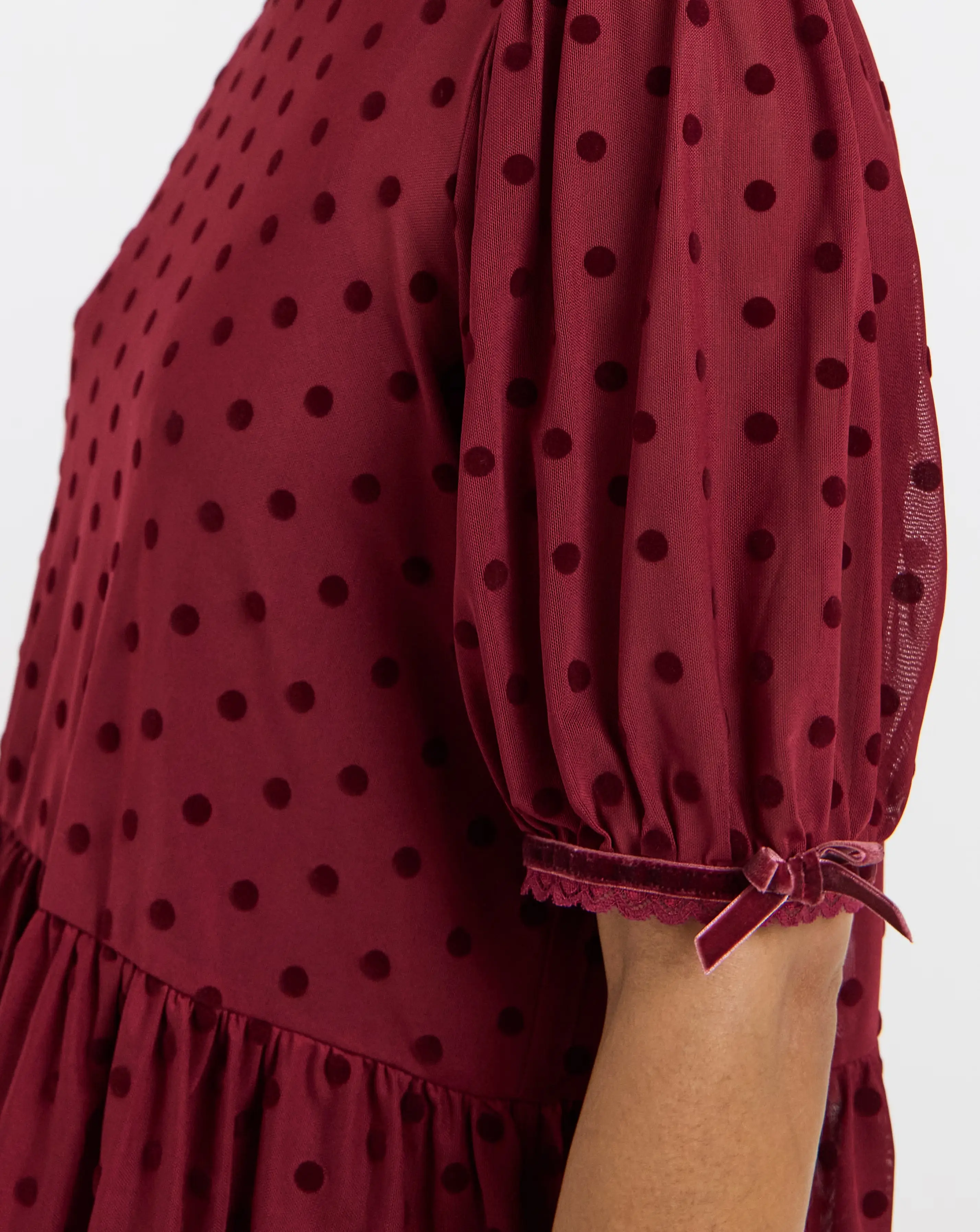 49115-burgundy-dobby-mesh-polka-dot-puff-sleeve-top-1.webp