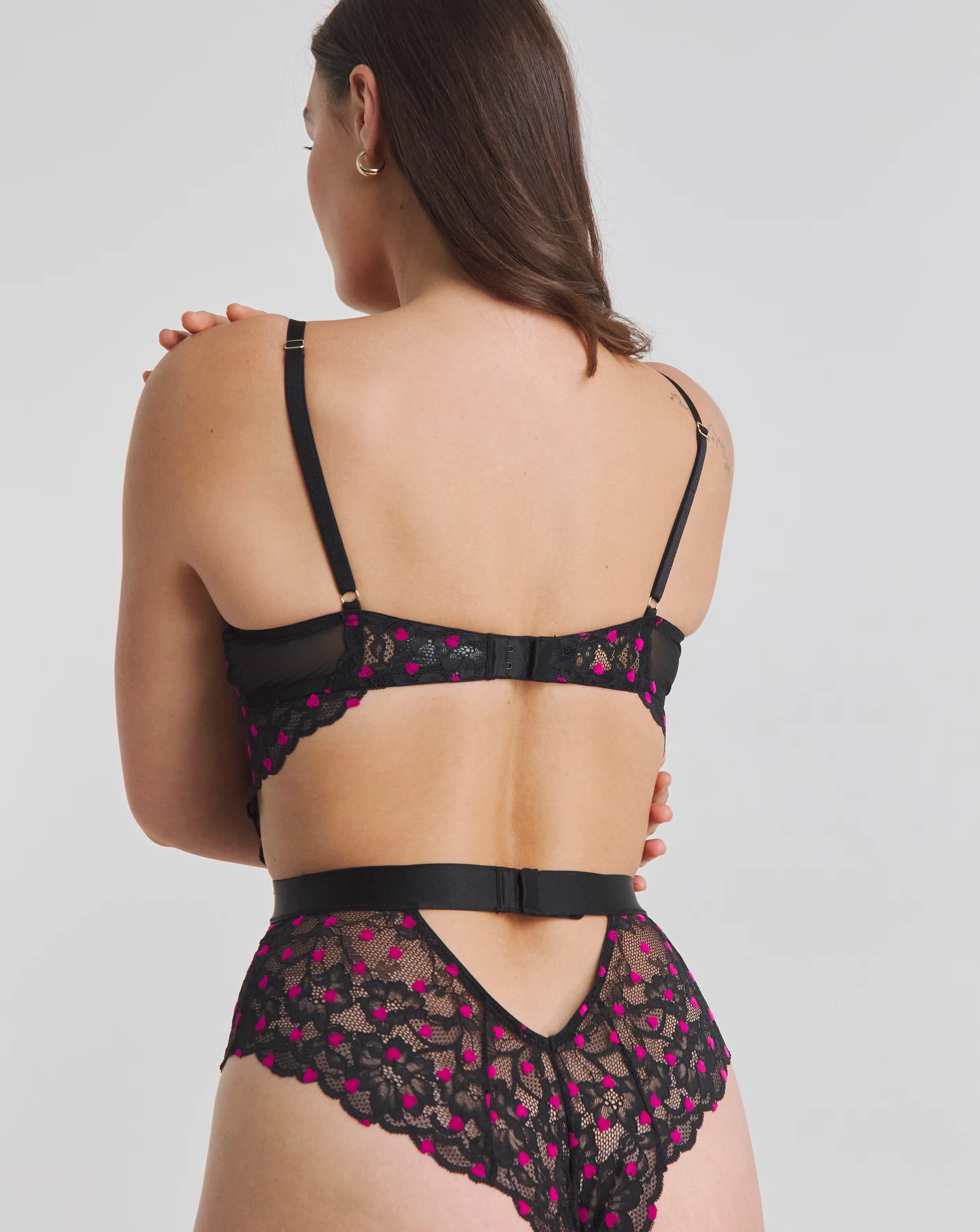 54522-ann-summers-hold-me-tight-planet-flocked-heart-body-black-pink-1.webp