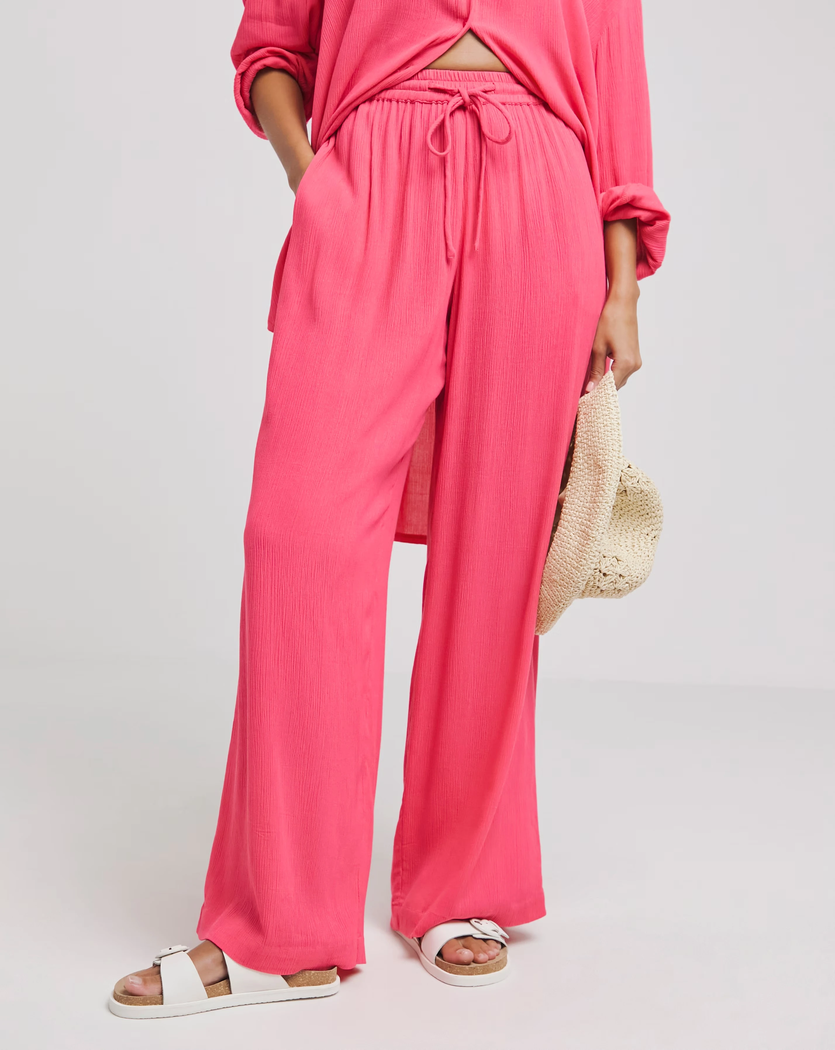 73880-simply-be-pink-tie-waist-crinkle-wide-leg-trousers-1.jpg