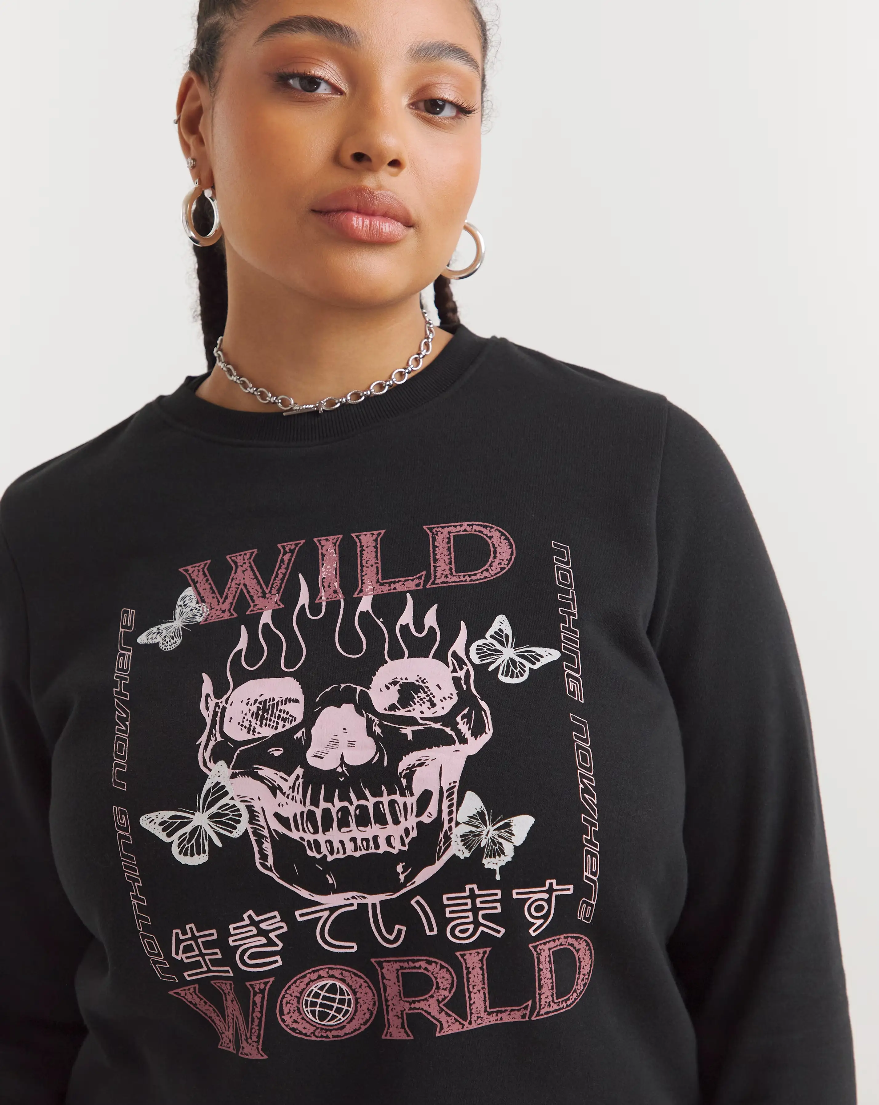 76145-black-wild-world-slogan-sweatshirt-1.jpg