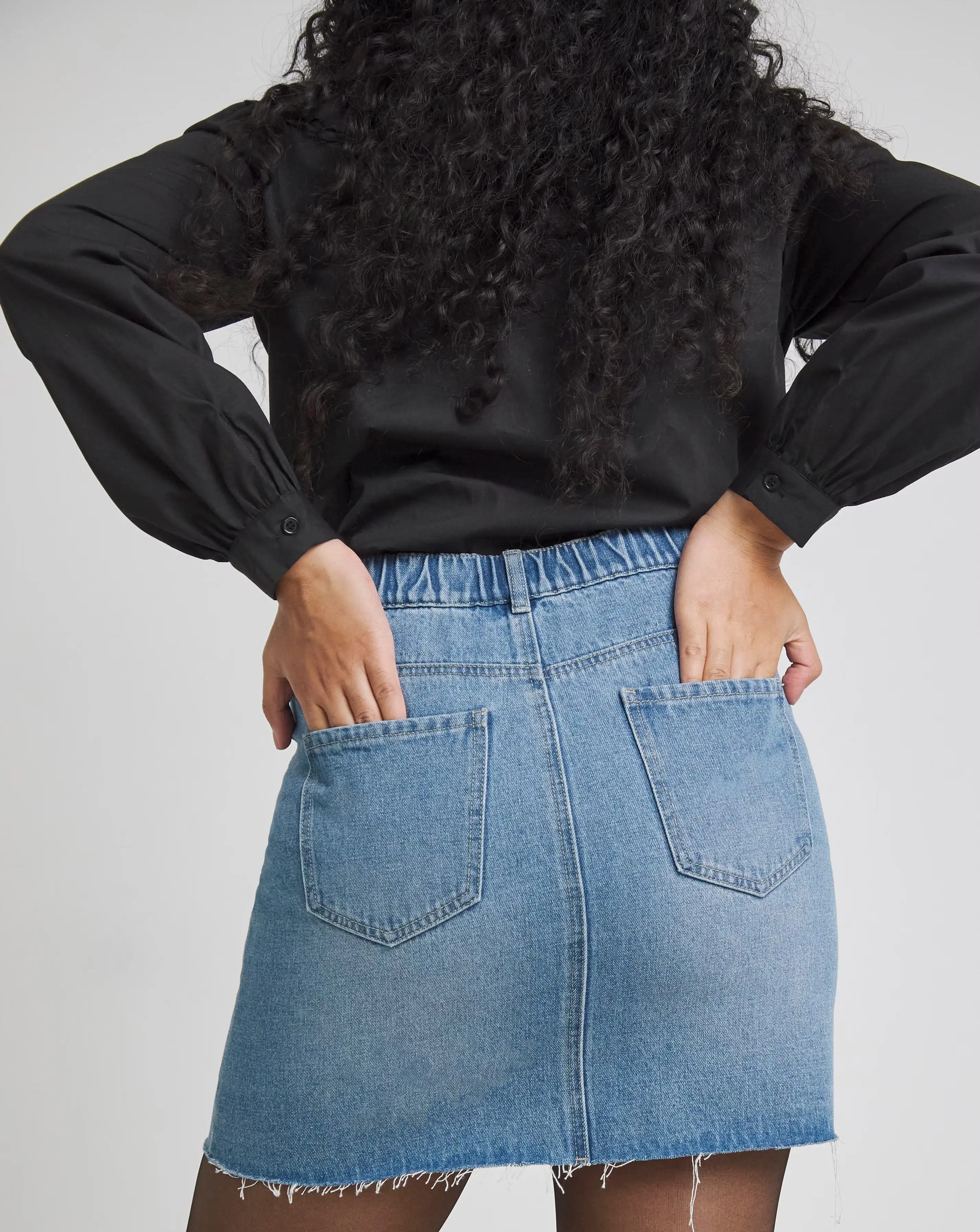7615-light-mid-blue-5-pocket-denim-mini-skirt-1.webp
