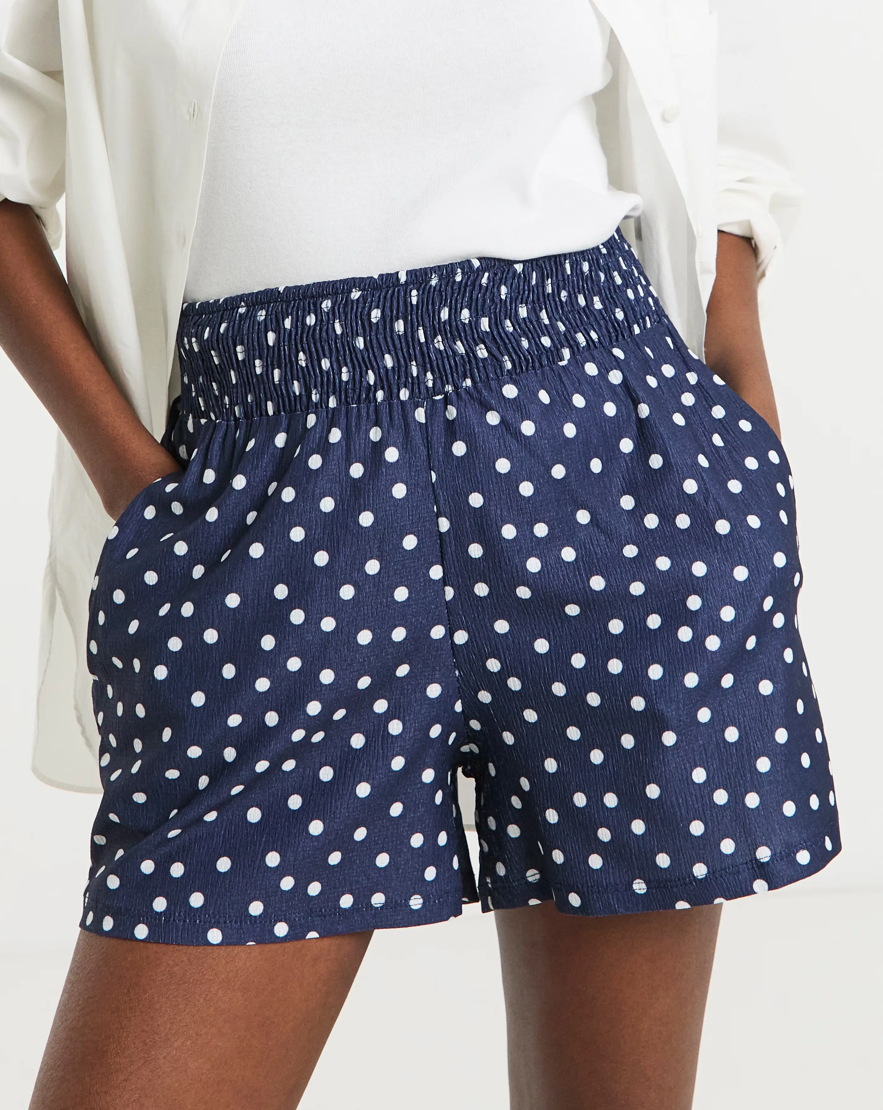 77427-navy-spot-textured-jersey-shirred-waist-short-1.webp