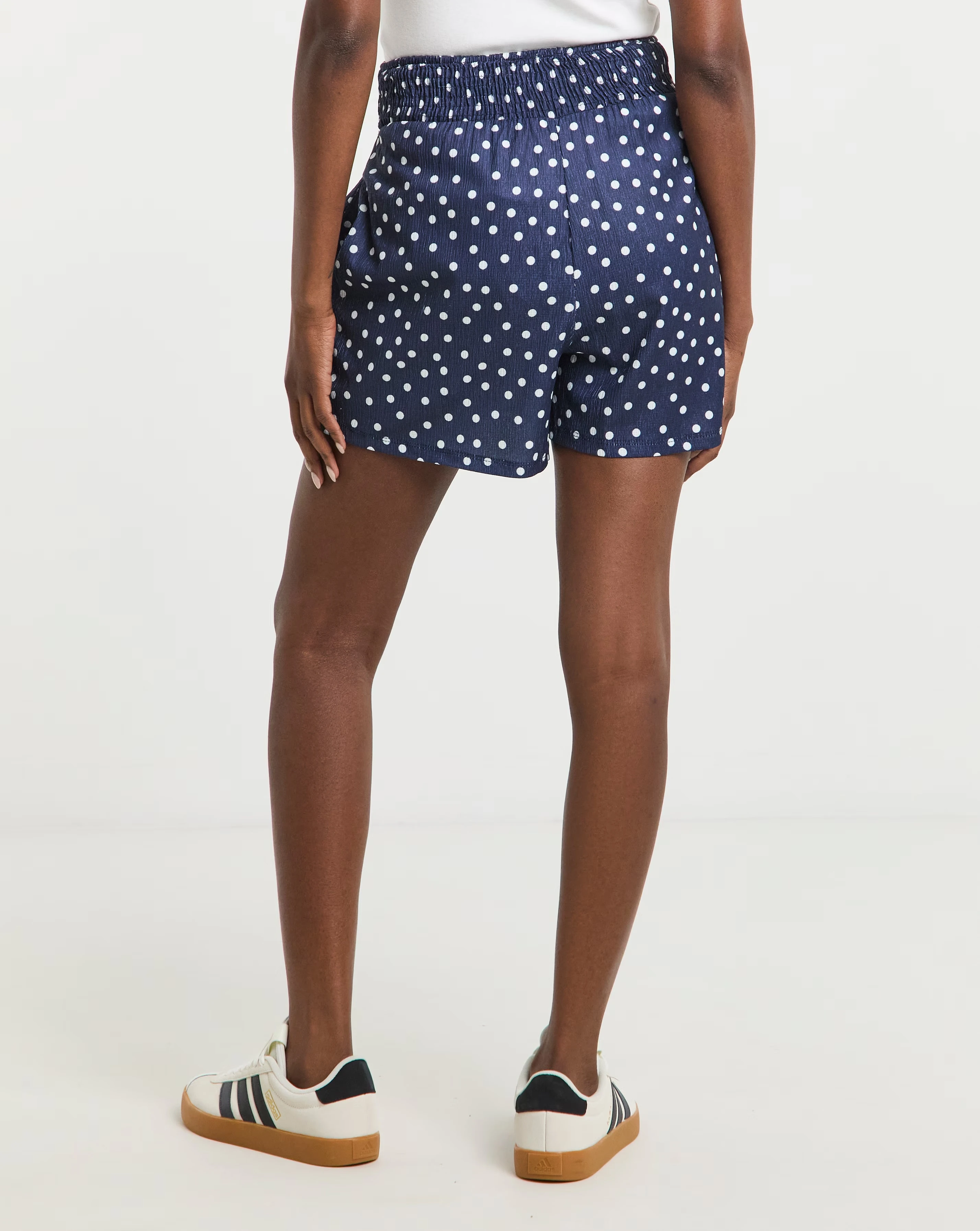 77427-navy-spot-textured-jersey-shirred-waist-short-1.webp
