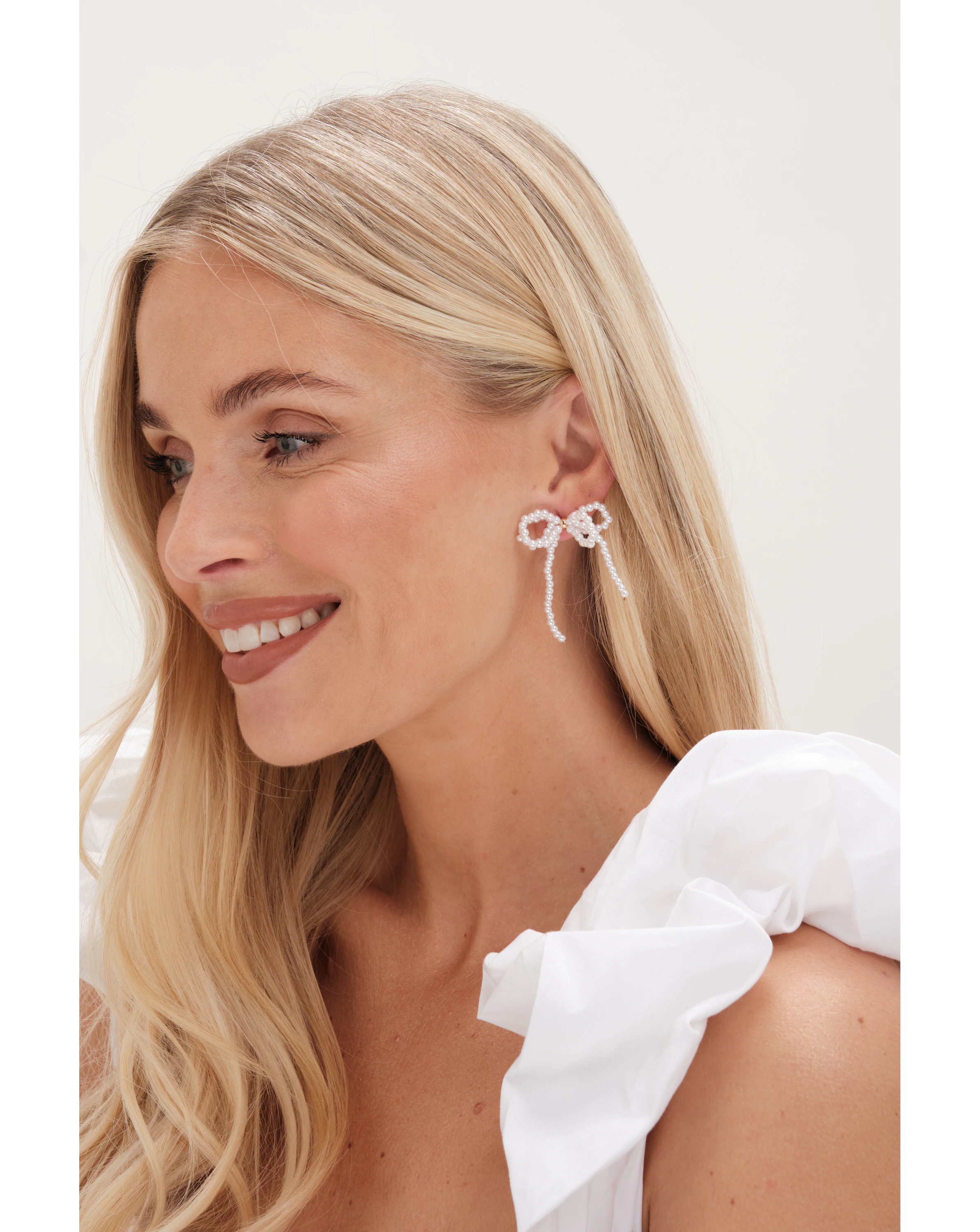 77993-mood-gold-pearl-bow-drop-earrings-1.jpg