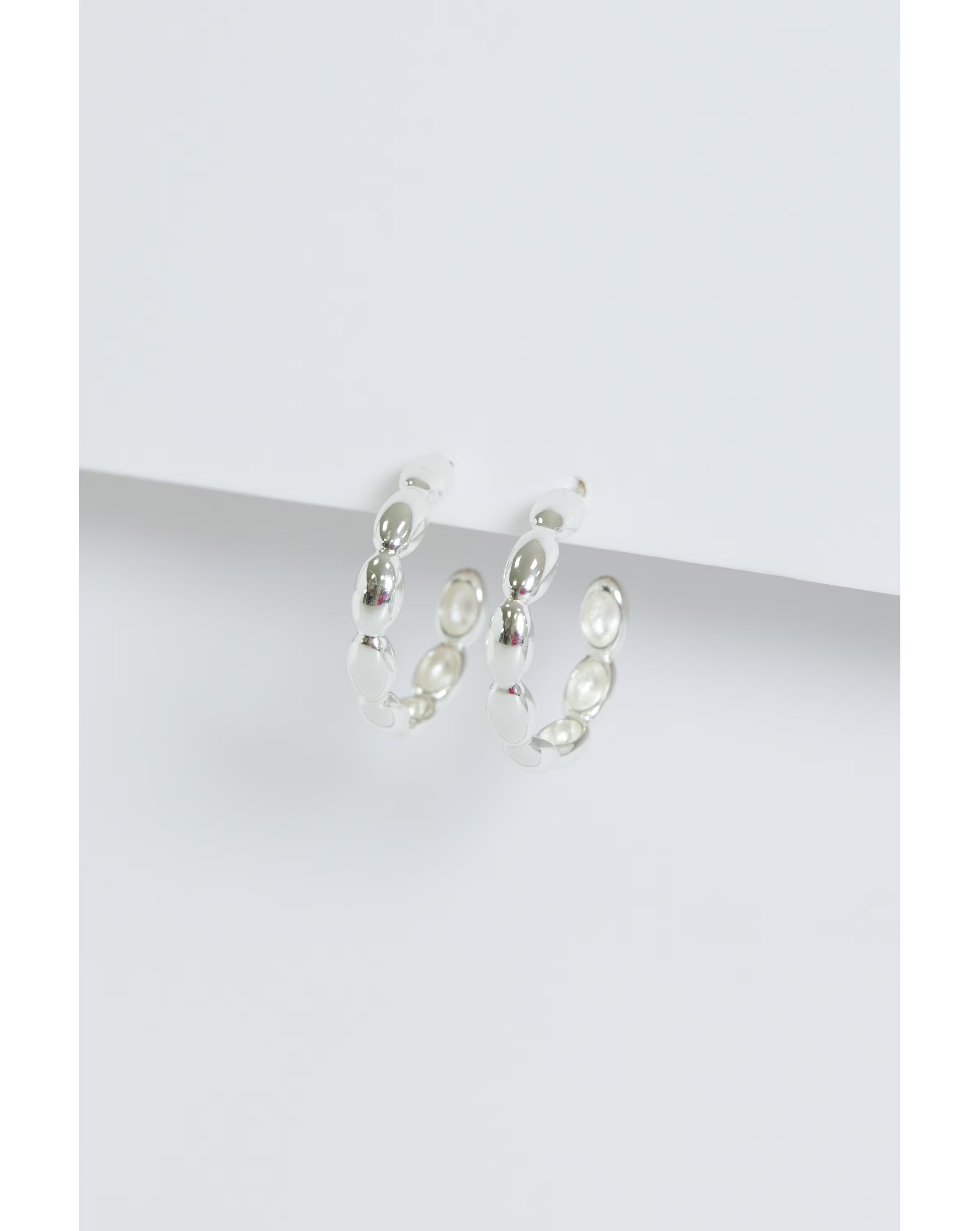 78009-simply-silver-sterling-silver-925-polished-pebble-hoop-earrings-1.jpg