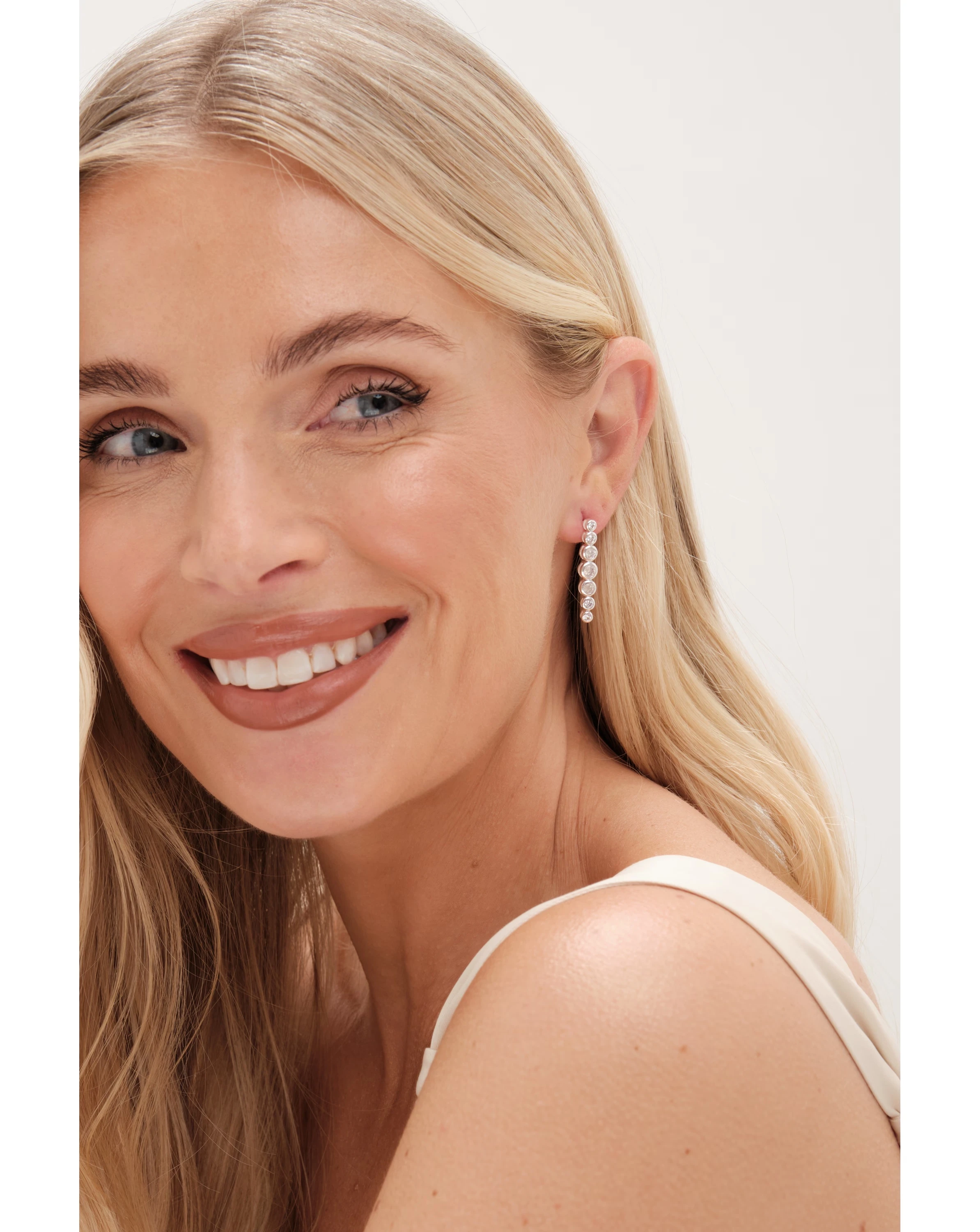 78019-simply-silver-sterling-silver-925-cubic-zirconia-graduated-tennis-drop-earrings-1.jpg