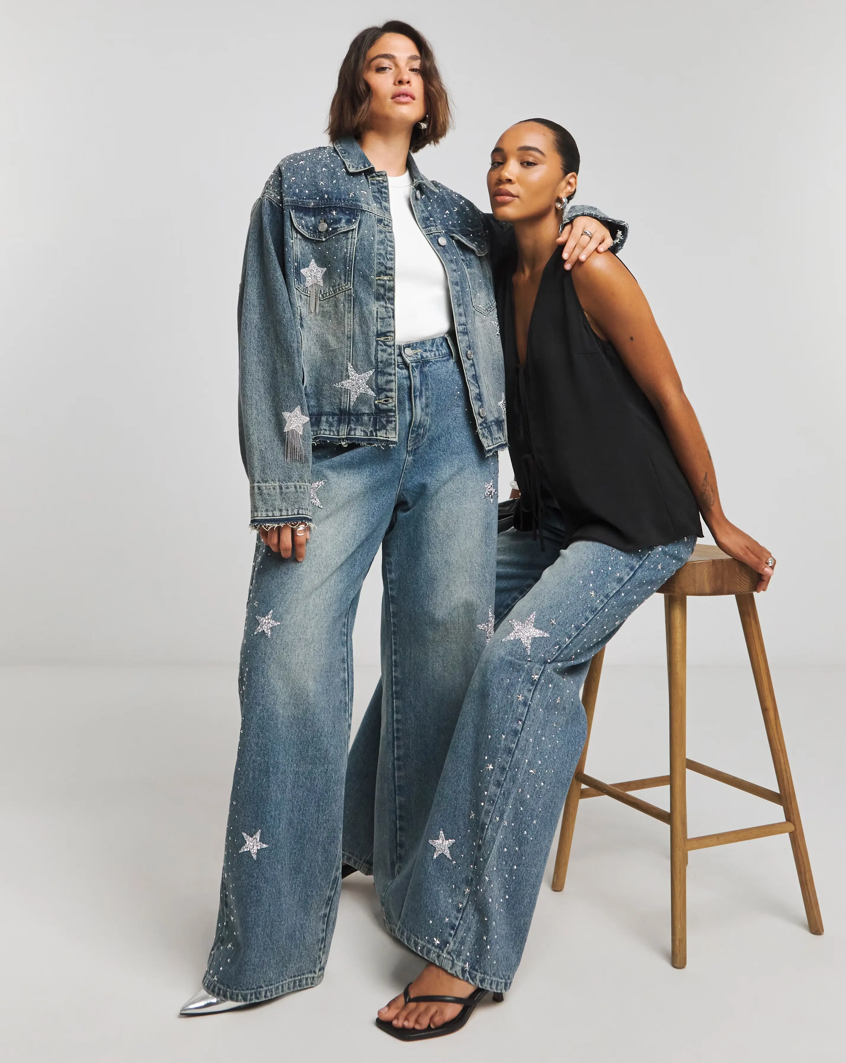 Simply Be X Twisted Wunder Mid Wash Star Embellished Wide Leg Jeans 1 8053-simply-be-x-twisted-wunder-mid-wash-star-embellished-wide-leg-jeans-1.webp