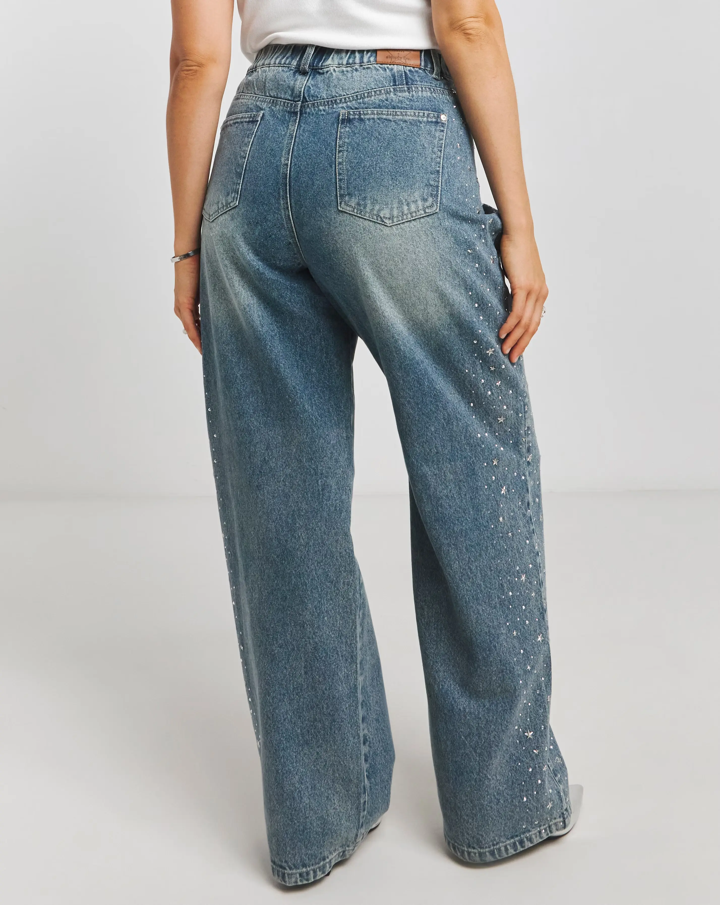 8053-simply-be-x-twisted-wunder-mid-wash-star-embellished-wide-leg-jeans-1.webp