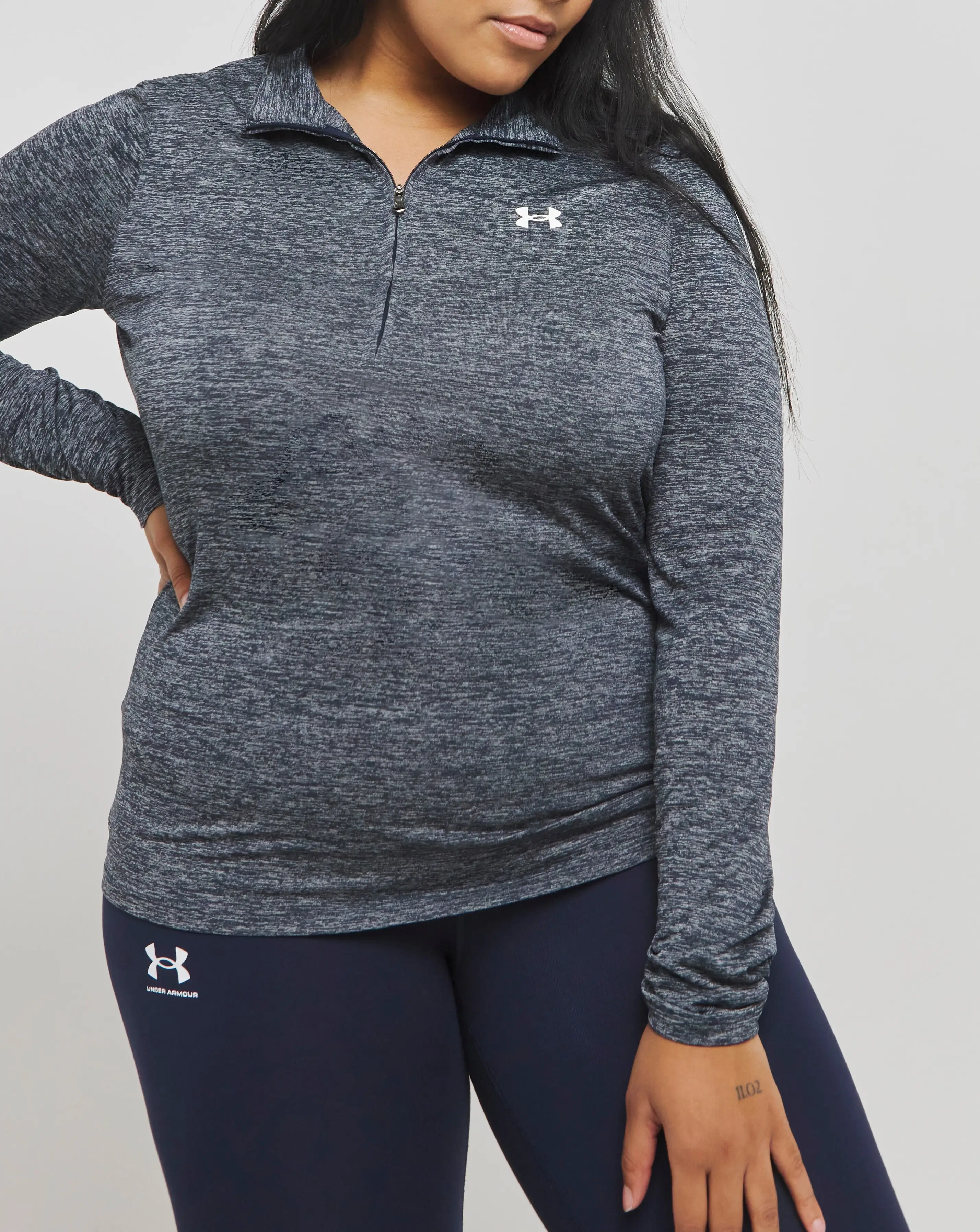 81912-under-armour-tech-1-2-zip-twist-top-1.webp