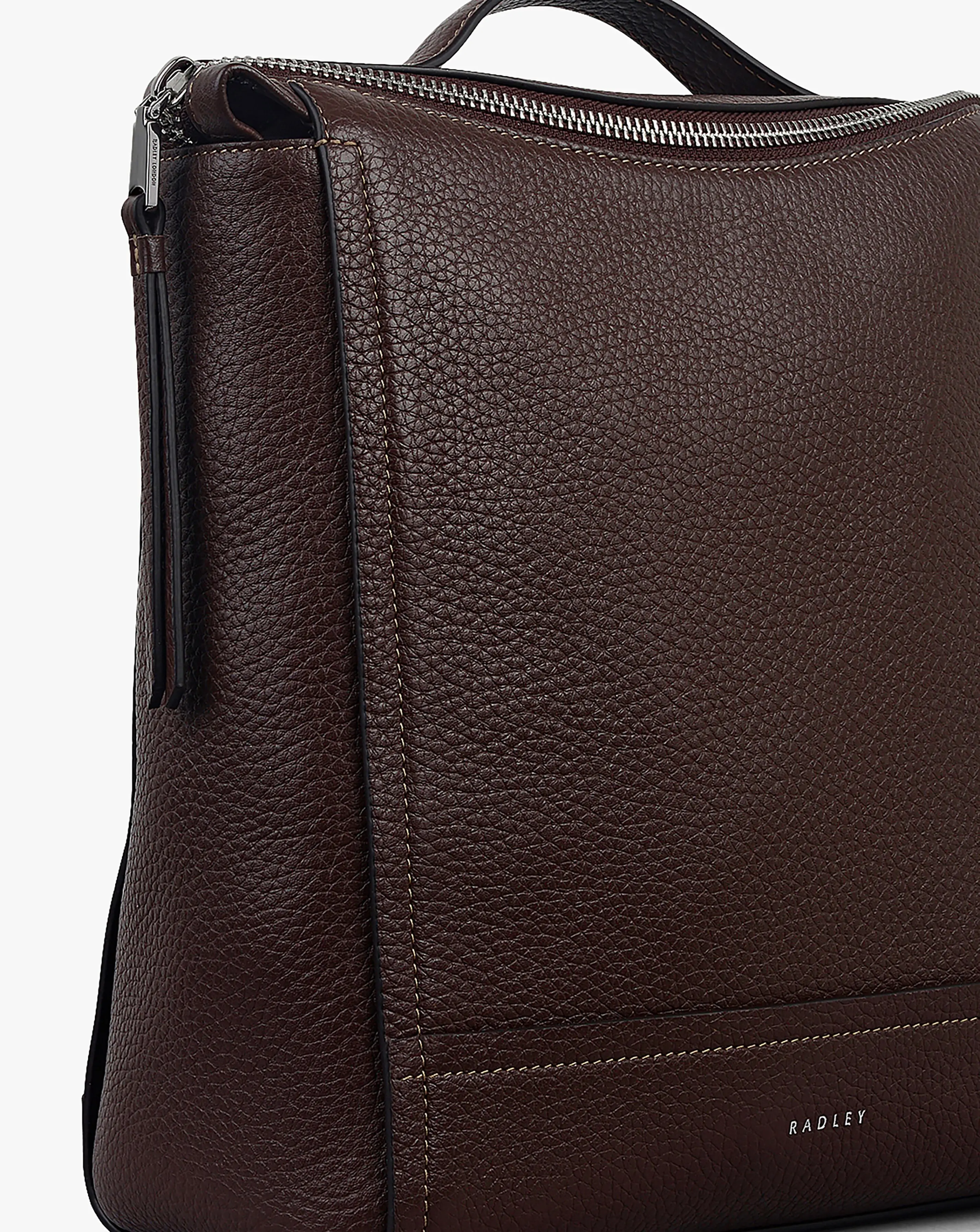 86037-radley-oak-street-small-tan-leather-backpack-1.webp
