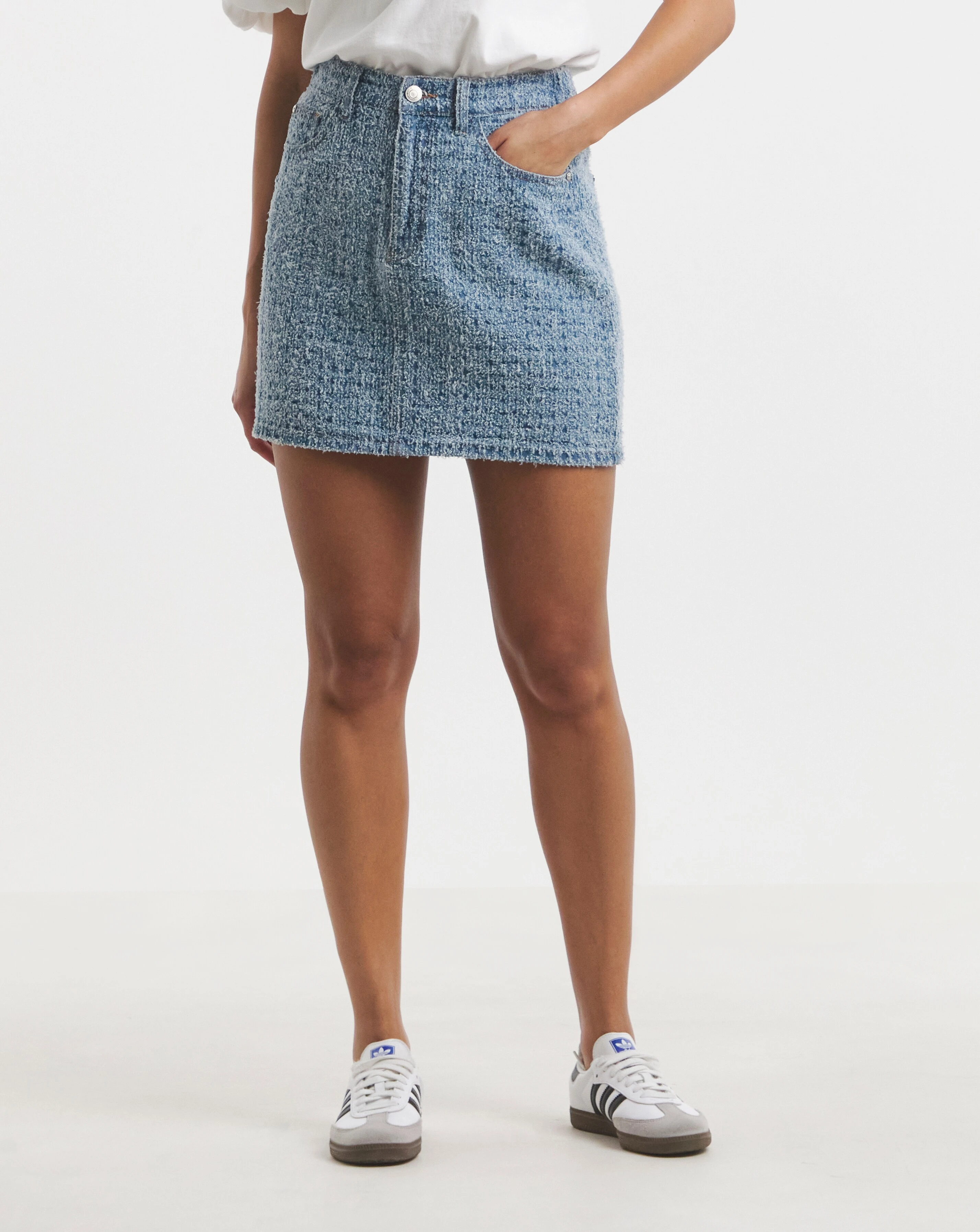 9092-light-mid-blue-distrssed-denim-mini-skirt-1.webp