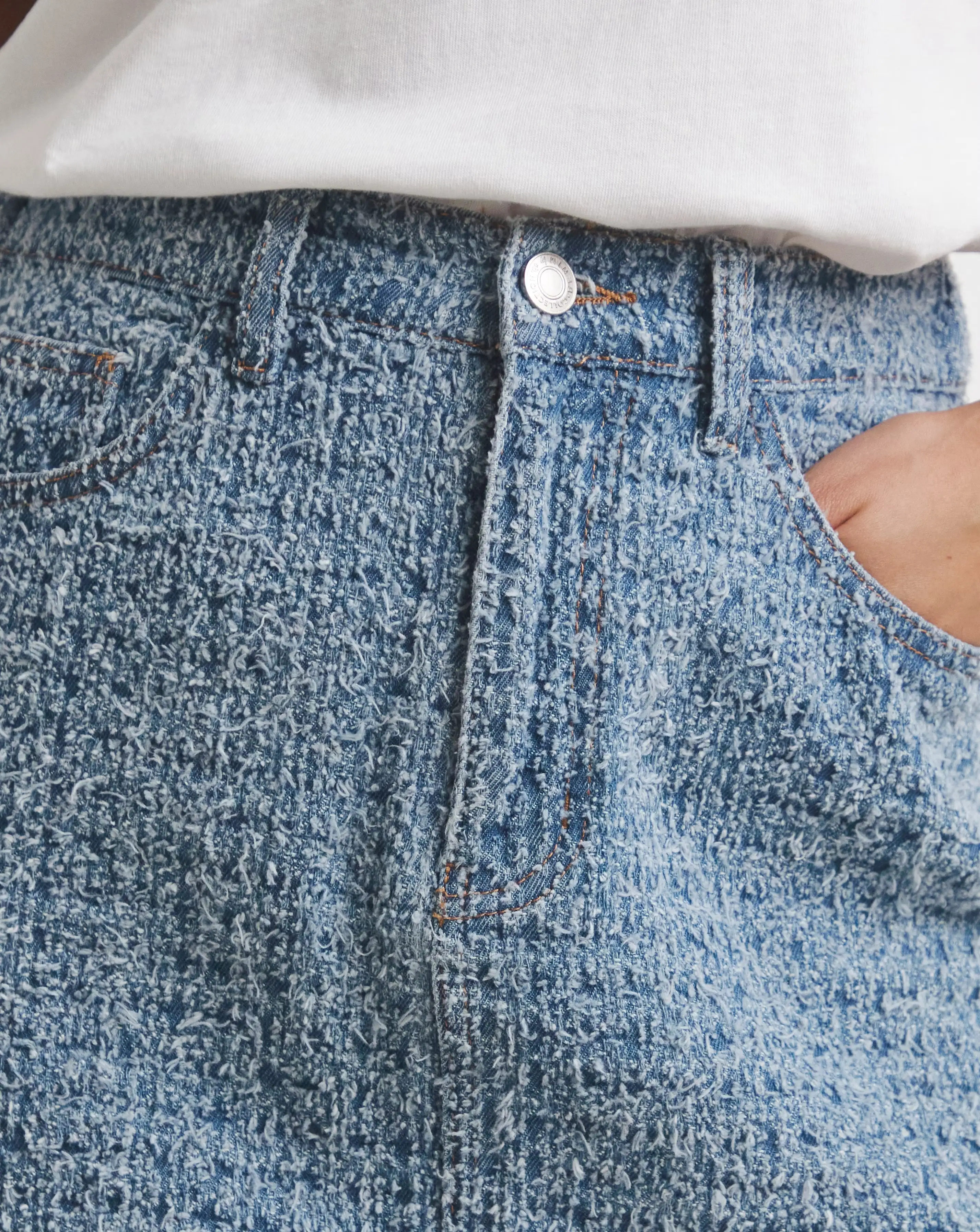9092-light-mid-blue-distrssed-denim-mini-skirt-1.webp