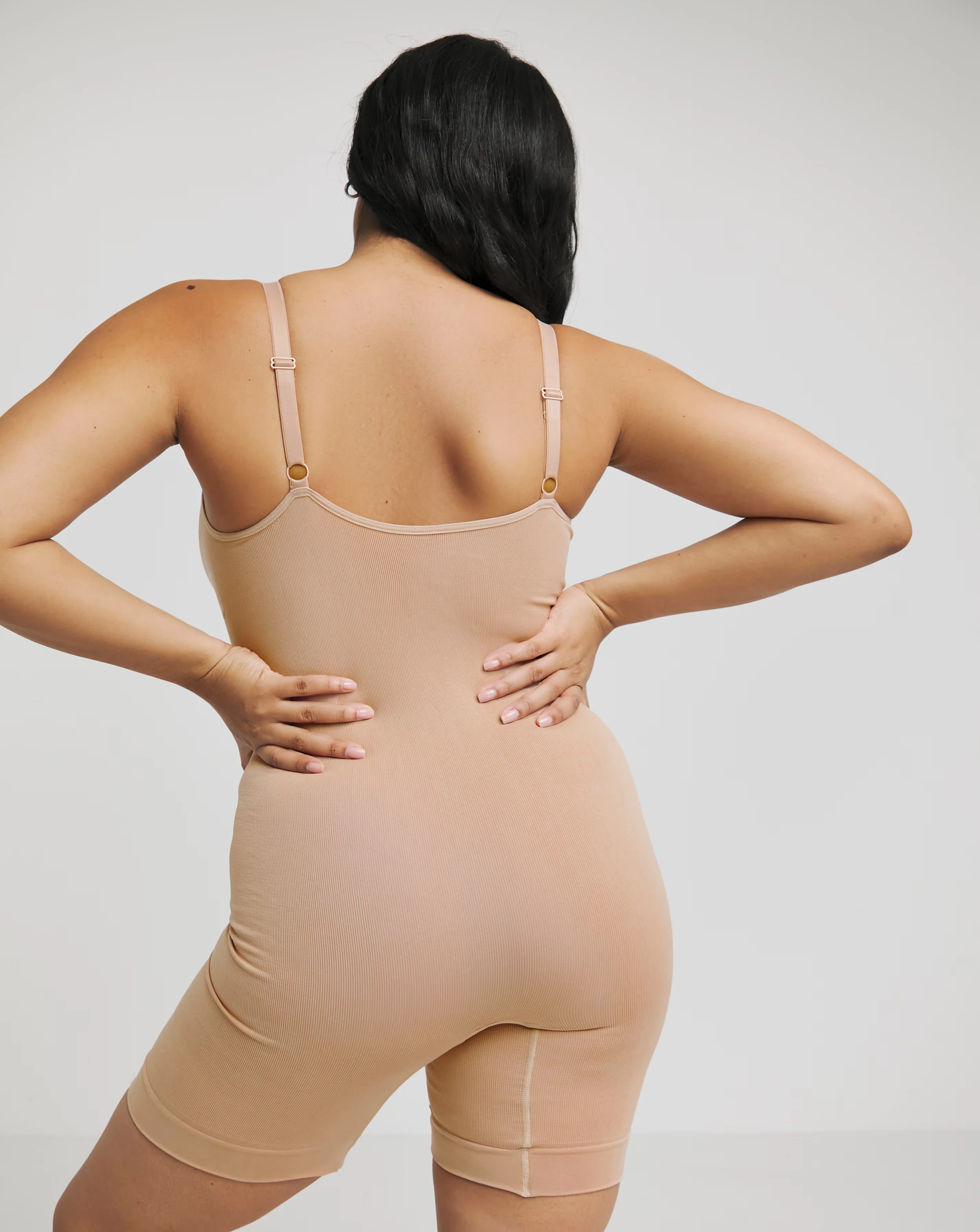 9296-magisculpt-medium-control-seamfree-mid-thigh-bodysuit-almond-1.jpg